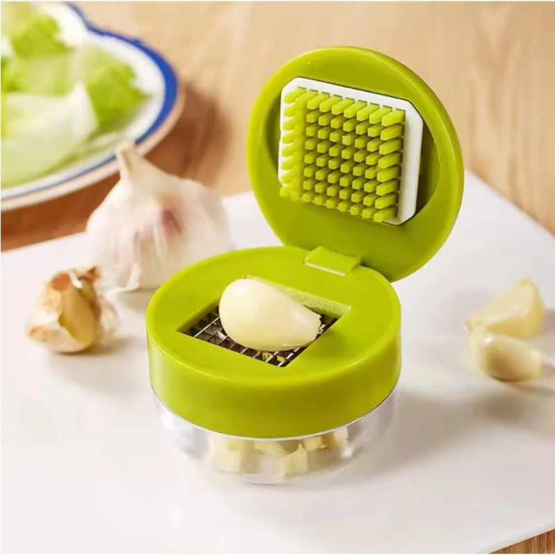 مفرمة ثوم يدوية مع صندوق تخزين - مراجعة Kitchen Gadgets Garlic وسعره