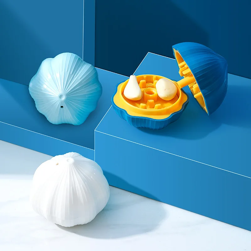 ماكينة الطحن الدوارة اليدوية م - مراجعة Kitchen Gadgets Garlic وسعره