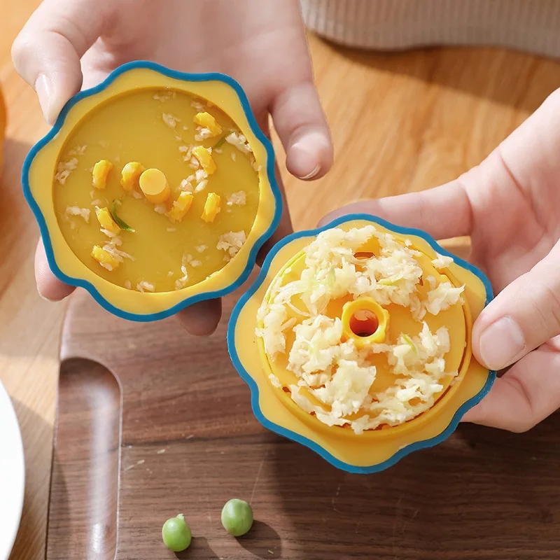 ماكينة الطحن الدوارة اليدوية م - مراجعة Kitchen Gadgets Garlic وسعره